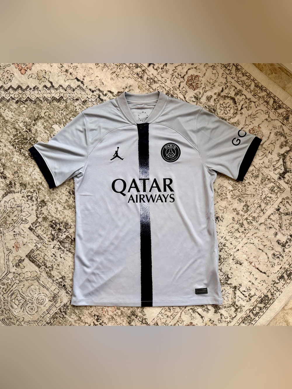 Jordan PSG Light Gray Soccer Jersey with Black Center Stripe and Accents mbappe